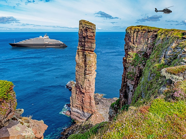 Helicopter and Scenic Eclipse off the Scottish coast