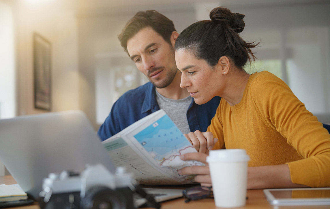 A couple planning their holiday