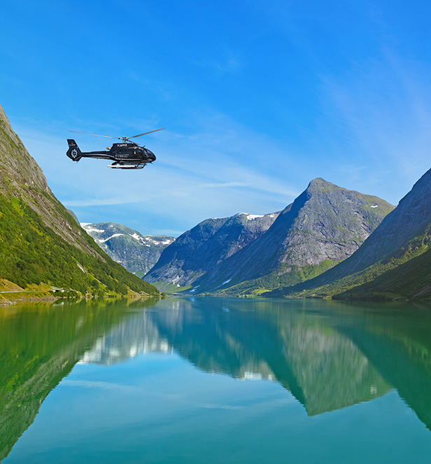 Scenic Helicopter flying over Norway, Fjords
