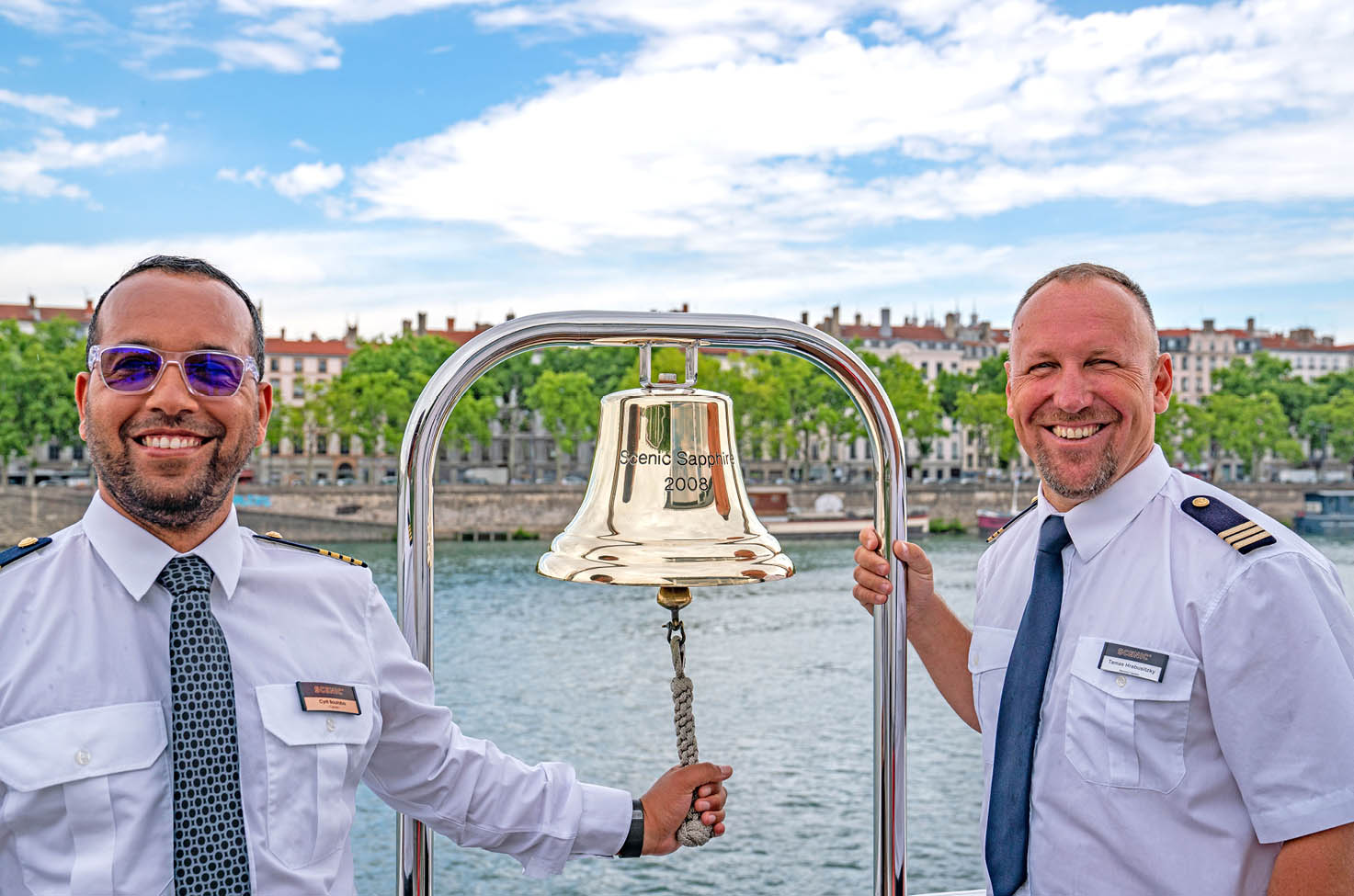 Two captains ringing a bell