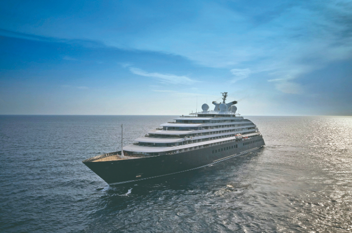 Scenic Eclipse ship in the ocean with a blue sky above
